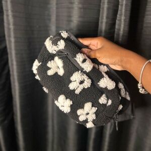Fluffy black and white flower Fanny pack